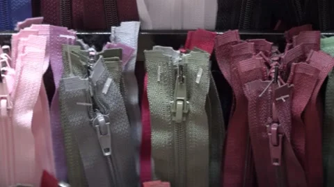 Colored fabrics in rolls on store shelves Stock Footage 169729365