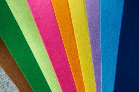Colored felt texture background, grey, brrown, green, lime, pink, orange, yel Stock Photos