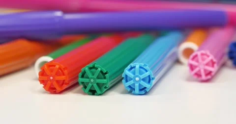 Colored felt-tip pens lies on white table, RGB, close-up shot video Video stock 315217702