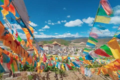 Colored flags on the background of a Buddhist monastery Stock Photos