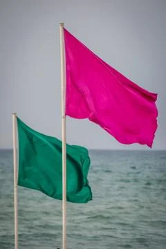 Colored flags over saaidia beach Stock Photos