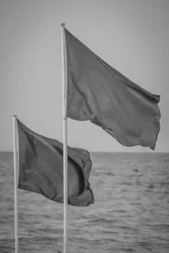 Colored flags over saaidia beach Stock Photos