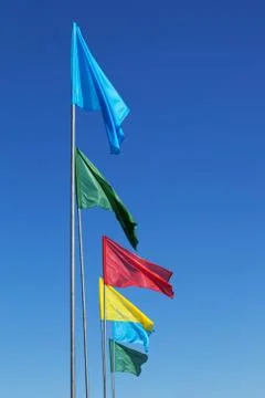 Colored flags on sky background 스톡 사진