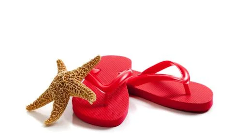 Colored flipflops on a white background Stock Photos