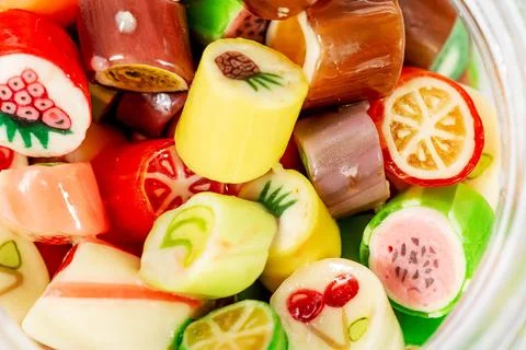 Colored fruit lollipops background Stock Photos