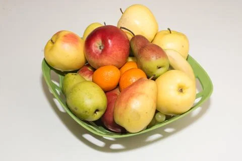 Colored fruits on table Stock Photos