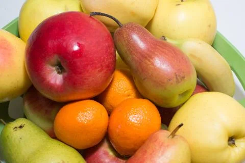 Colored fruits on table. Stock Photos