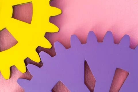 Colored gear wheels for team work symbolism Stock Photos