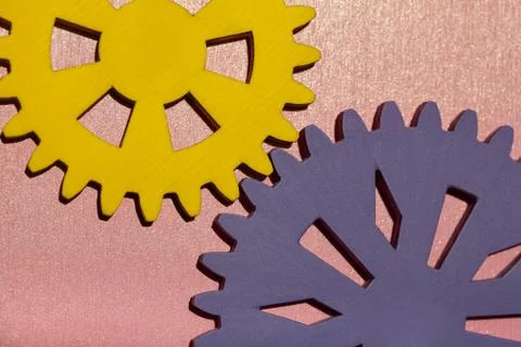 Colored gear wheels for team work symbolism Stock Photos