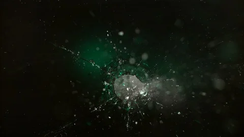 Colored Glass breaking in slow motion on black background Stock Footage 126223301