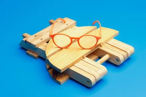Colored glasses on plain background, modern glasses for fashion. Stock Photos