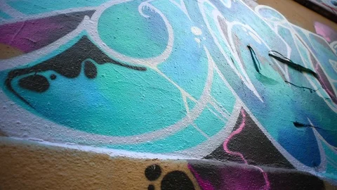 Colored graffiti on a city wall (with slider) Stock Footage 109688059