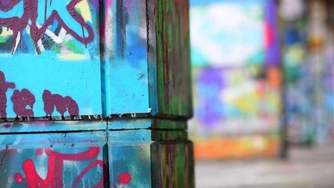 Colored graffiti on a city wall (with slider) Stock Footage 109794002