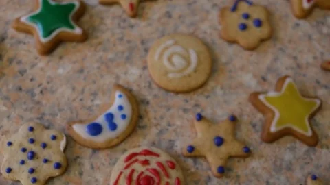 Colored handmade gingerbreads are on the table. Day, indoors, natural light, kit Stock Footage 83556096
