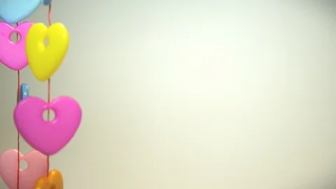 Colored hearts on a rope Stock Footage 99476596