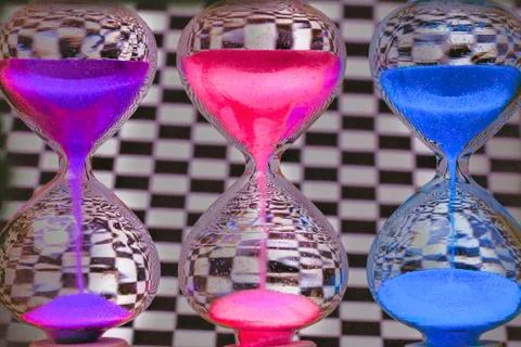 Colored hourglass Stock Photos