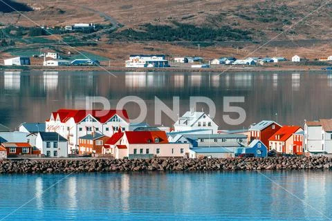 Colored houses in the fjord Stock Photos