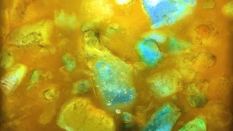 Colored ice crystals, melting process, Macro shot. Stock Footage 197416792