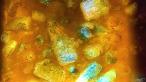 Colored ice crystals, melting process, Macro shot. Stock Footage 197416801