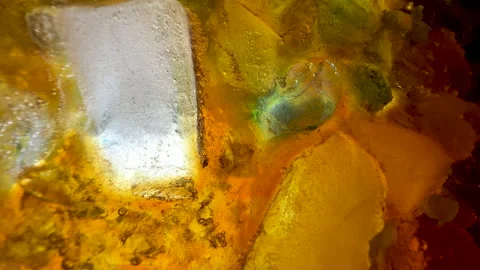 Colored ice crystals, melting process, Macro shot. Stock Footage 197416972