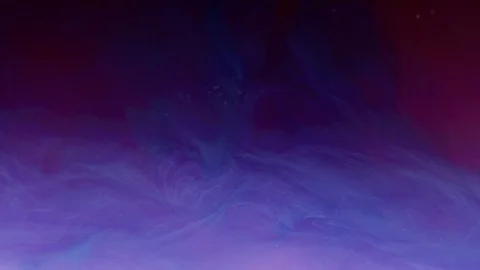 Colored ink dissolving in water Stock Footage 100023574