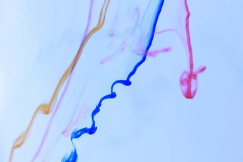 Colored Ink Drop Lines Dynamic Motion in Water. Ambient Soft Background. Stock Photos