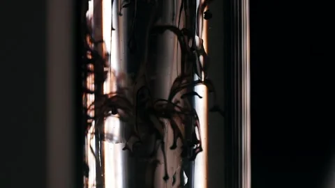 Colored ink drop in water, drop color mixture falls on water. Slow motion Stock Footage 188750328