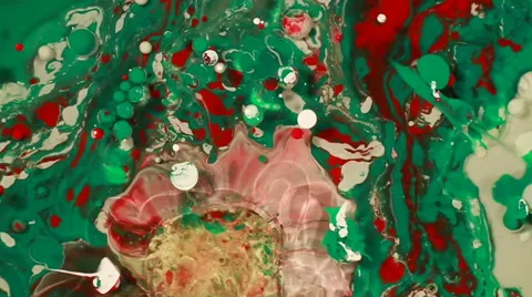 Colored inks react to a drop of liquid soap in the oil. 50 fps 스톡 동영상 67549919