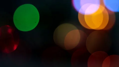 Colored Intermittent defocused lights, sparkling flickering bokeh lights. Stock Footage 260321703