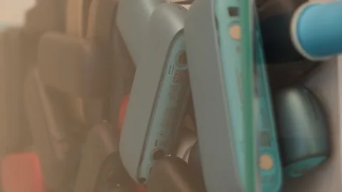 Colored IQOS Electronic Cases Piled Together  Recycling Stock Footage 300092360