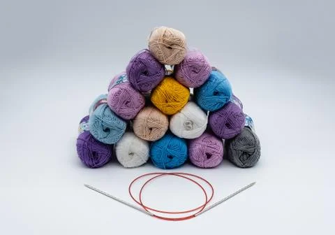 Colored knitting threads and needles Stock Photos