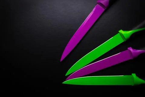 Colored knives Stock Photos