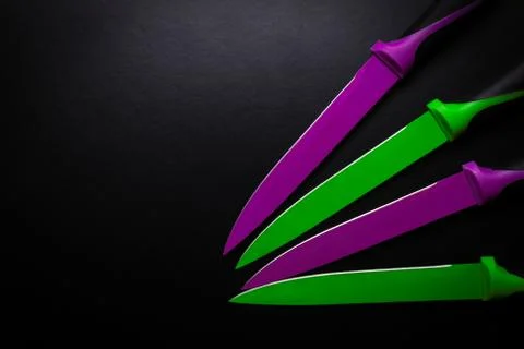 Colored knives Stock Photos
