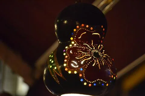 A colored lamp with small holes inside Stock Photos