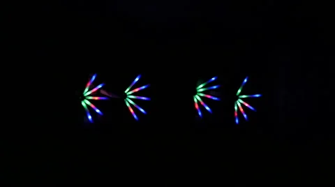 Colored led backlight swirling on a black background Stock Footage 62507931