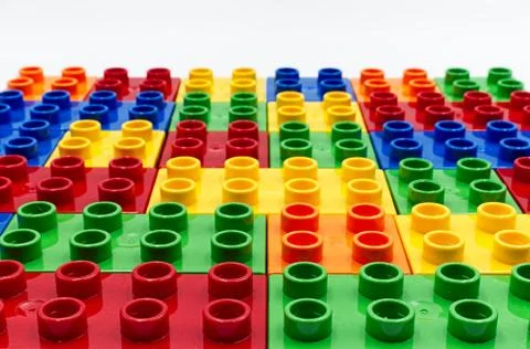 Colored lego plastic building blocks isolated on white background Stock Photos
