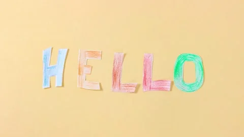 Colored letters made of paper are formed into the word HELLO Stock Footage 161754710