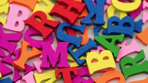Colored letters rotate in a circle. Stock Footage 234995991