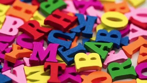 Colored letters rotate in a circle. Stock Footage 234996001