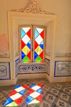 Colored light projection-leaded window of pavilion-NeoRococo palace. Estoi-PT Stock Photos