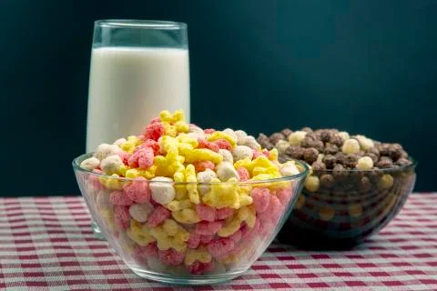Colored light snacks. Breakfast in a plate and a glass of milk. Diet and calo Stock Photos