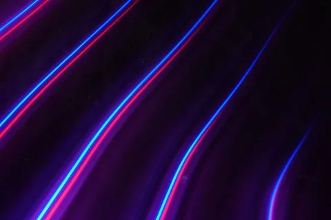 Colored Light trails on a black background Stock Photos