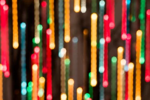 Colored lights blurred in motion Stock Photos