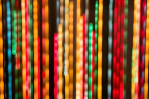 Colored lights blurred in motion Stock Photos