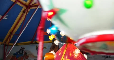 The colored lights of a children's carousel. Stock Footage 143113680