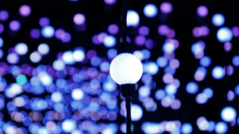 Colored lights in a dark room Stock Footage 229499082
