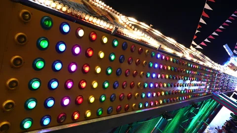Colored Lights Flash in Amusement Park or Fair Stock Footage 198347791
