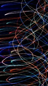 Colored lines on a black background.textura Stock Illustration