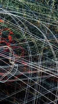 Colored lines of lights on a black background Foto stock