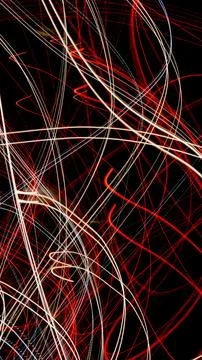 Colored lines of lights on a black background Foto stock